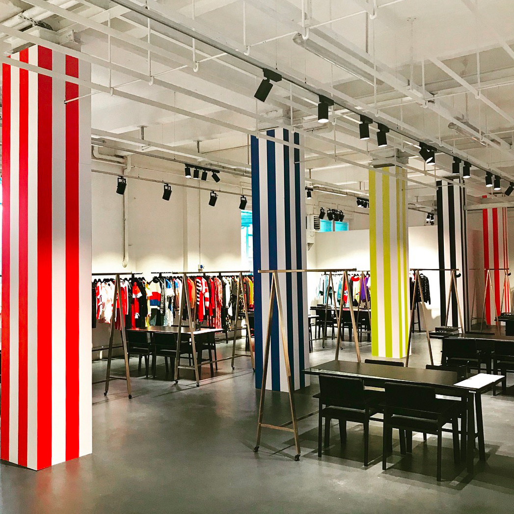 MSGM striped columns spatial design showroom presentation