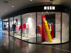 MSGM window design totem window display pink yellow red sticker colorblock