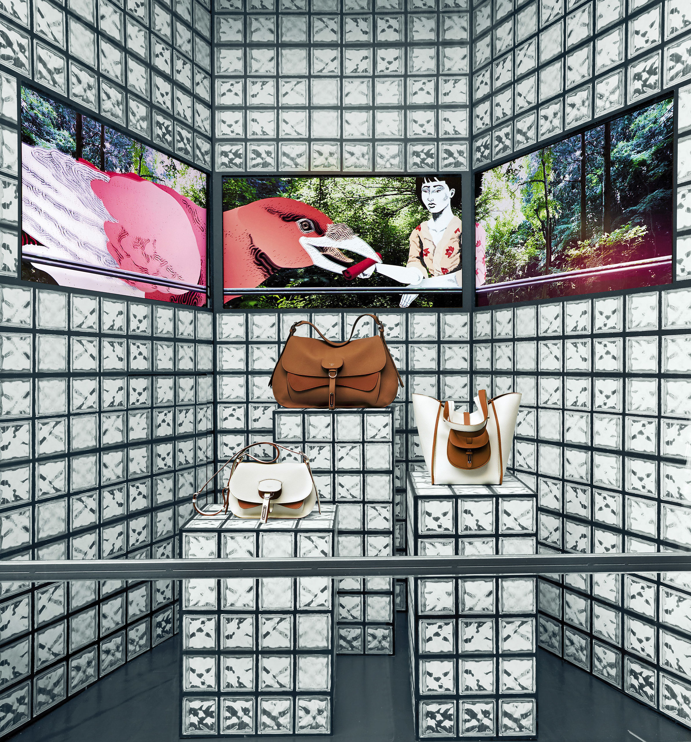 Fontana Milano 1915 bags window display with video and printed glass blocks