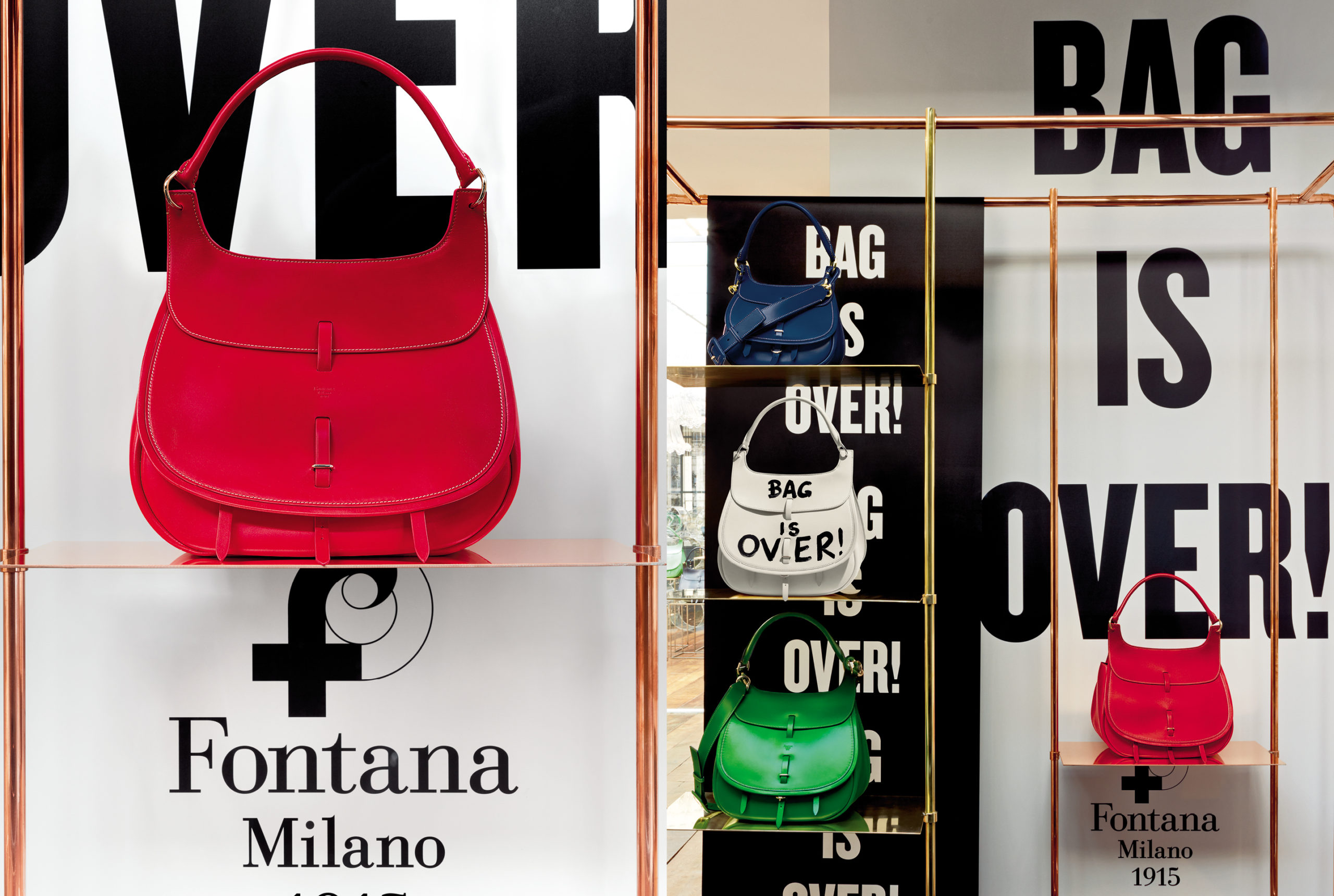 Fontana Milano 1915 red and green bag, brass window display design