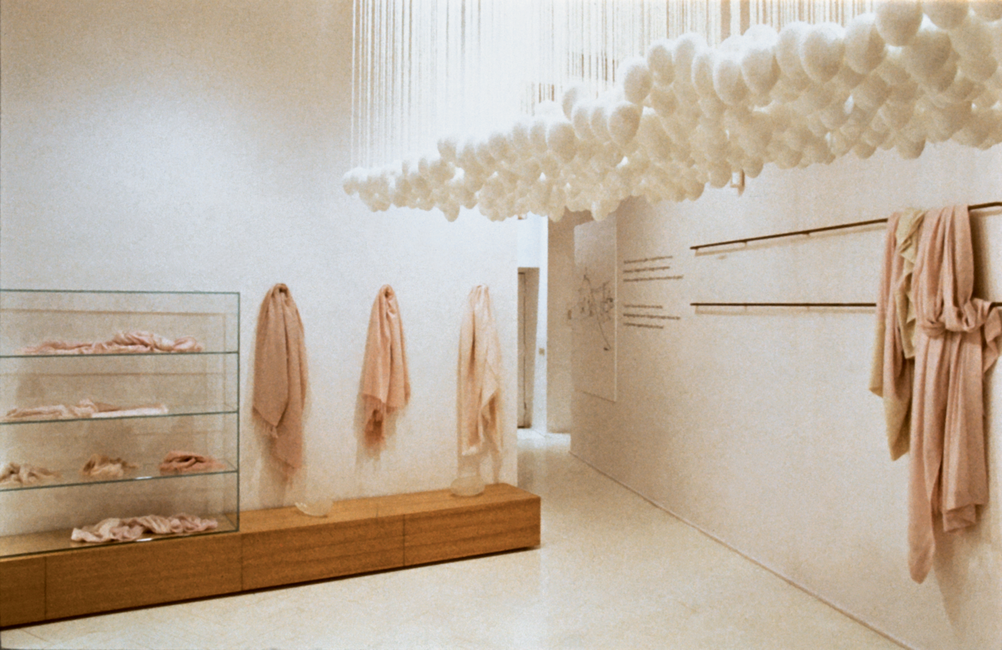 white, egg, spatial design, styling, showroom, throw
