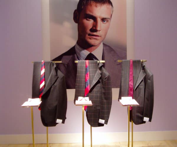 Ballantyne suits, ties, shirts with brass and male photo